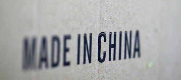 Words 'Made in China' are pictured on a box of products imported from China  - 俄罗斯卫星通讯社