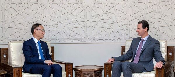 敘利亞總統阿薩德和中國外長助理陳曉東（資料圖片） - 俄羅斯衛星通訊社