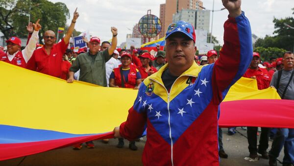 Участники акции в поддержку легитимного президента Венесуэлы Николаса Мадуро в Каракасе - 俄罗斯卫星通讯社