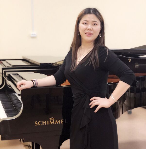 武晋芳与她热爱的钢琴 - 俄罗斯卫星通讯社