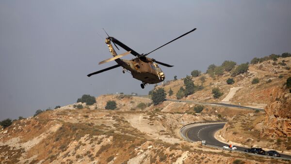 Израильский военный вертолет в районе Голанских высот  - 俄罗斯卫星通讯社