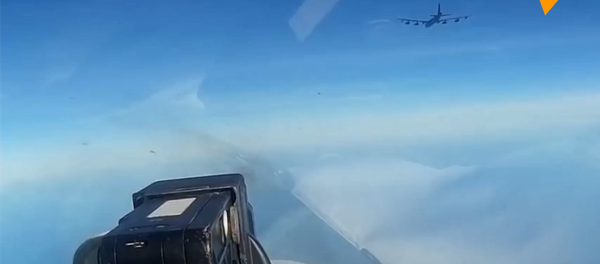 俄战机伴飞美国B-52轰炸机 - 俄罗斯卫星通讯社