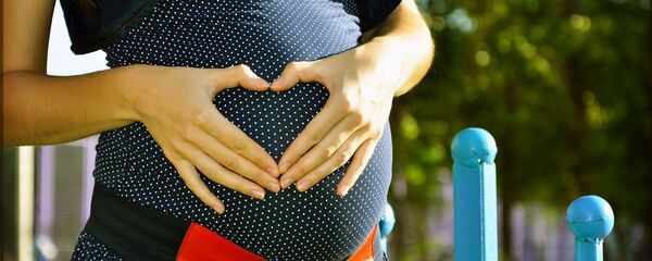 Беременная женщина - 俄罗斯卫星通讯社