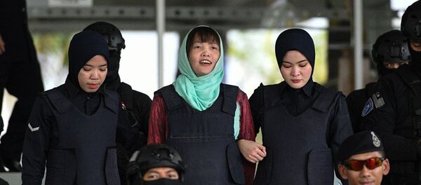 Vietnamese national Doan Thi Huong (C) is escorted by Malaysian police out of the High Court in Shah Alam on April 1, 2019 Vietnamese national Doan Thi Huong (C) is escorted by Malaysian police out of the High Court in Shah Alam on April 1, 2019 - 俄罗斯卫星通讯社
