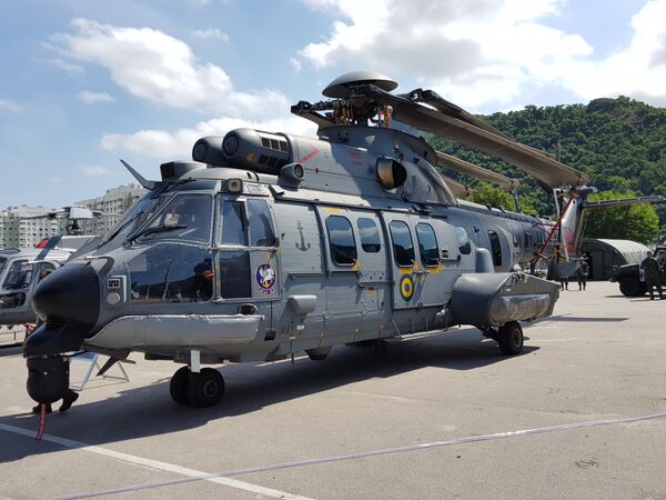 法国欧洲直升机公司（后改为空中客车直升机公司，Airbus Helicopter）下属的巴西全资子公司Helibras所生产的H225M中型直升机，它隶属超级美洲狮/豹（Super Cougar/Puma）直升机家族 - 俄罗斯卫星通讯社