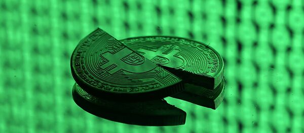 美中贸易战迫使投资者们购进比特币 美中贸易战迫使投资者们购进比特币 - 俄罗斯卫星通讯社