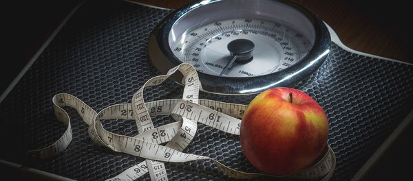 Весы и измерительная лента - 俄罗斯卫星通讯社