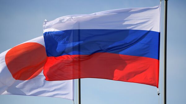 Государственные флаги России и Японии - 俄羅斯衛星通訊社