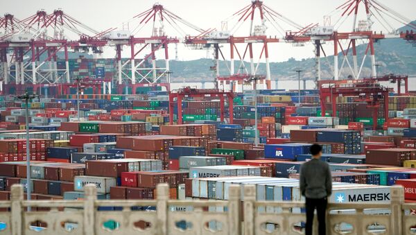 Containers are seen at the Yangshan Deep Water Port in Shanghai - 俄羅斯衛星通訊社