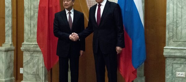 俄罗斯外长谢尔盖·拉夫罗夫与中国外长王毅 - 俄罗斯卫星通讯社