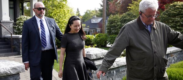 Huawei's Financial Chief Meng Wanzhou leaves her family home flanked by private security in Vancouver, British Columbia - 俄罗斯卫星通讯社