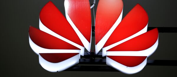 A Huawei logo is seen at an exhibition during the World Intelligence Congress in Tianjin - 俄罗斯卫星通讯社