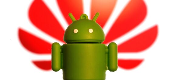 3-D printed Android logo is seen in front of a displayed Huawei logo in this illustration picture - 俄罗斯卫星通讯社
