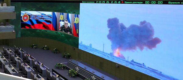Видеотрансляция пуска ракеты комплекса Авангард с гиперзвуковым планирующим крылатым боевым блоком в Национальном центре управления обороной РФ - 俄罗斯卫星通讯社