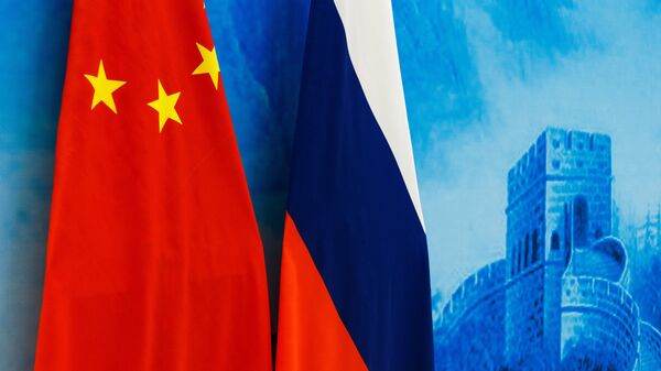 Флаги России и КНР - 俄罗斯卫星通讯社