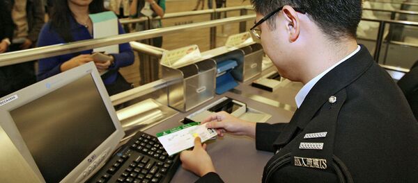 Паспортный контроль в аэропорту Гонконга Паспортный контроль в аэропорту Гонконга - 俄罗斯卫星通讯社