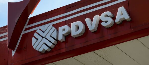 Логотипа венесуэльской государственной нефтяной компании PDVSA на заправочной станции в Каракасе Логотипа венесуэльской государственной нефтяной компании PDVSA на заправочной станции в Каракасе - 俄罗斯卫星通讯社