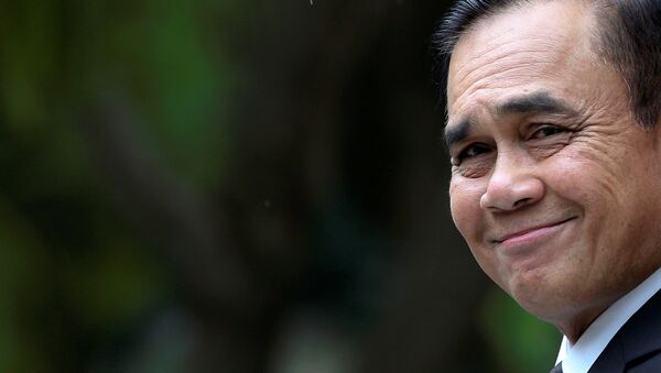 Thailand's Prime Minister Prayuth Chan-ocha smiles before speaking to media members at the Government House in Bangkok - 俄羅斯衛星通訊社