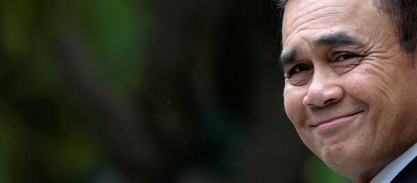 Thailand's Prime Minister Prayuth Chan-ocha smiles before speaking to media members at the Government House in Bangkok - 俄羅斯衛星通訊社