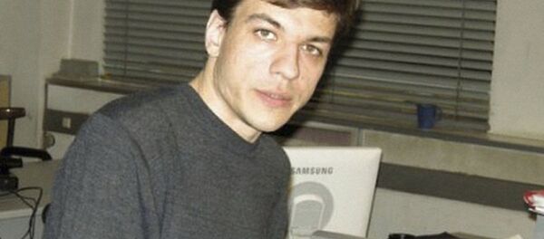 奥列格·季先科 - 俄罗斯卫星通讯社