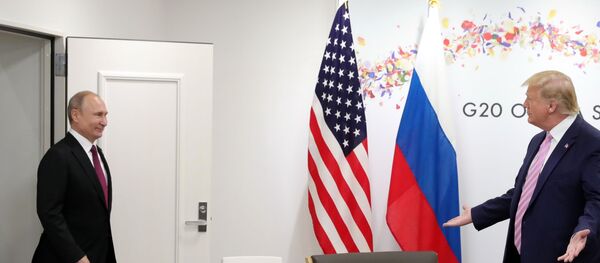 Президент РФ Владимир Путин и президент США Дональд Трамп во время встречи на полях саммита Группы двадцати в Осаке - 俄罗斯卫星通讯社