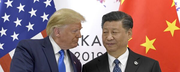 Президент США Дональд Трамп и глава КНР Си Цзиньпин на встрече в рамках саммита G20 в Осаке - 俄羅斯衛星通訊社