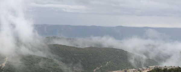 На передовой позиции армии САР в горной Латакии, на границе провинции Идлиб.  - 俄罗斯卫星通讯社