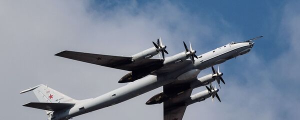 Противолодочный самолет Ту-142 во время репетиции воздушной части парада в честь Дня ВМФ России в Санкт-Петербурге - 俄罗斯卫星通讯社