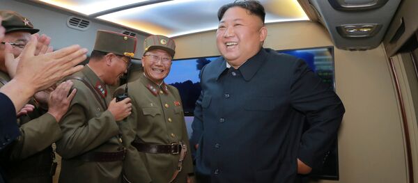 Лидер КНДР Ким Чен Ын во время запуска ракеты - 俄羅斯衛星通訊社