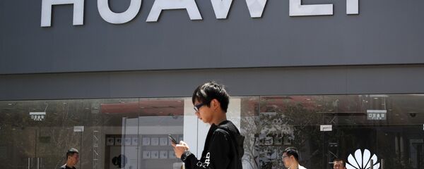 因美国制裁销售额下滑 华为聘请知名律所在美展开游 - 俄罗斯卫星通讯社