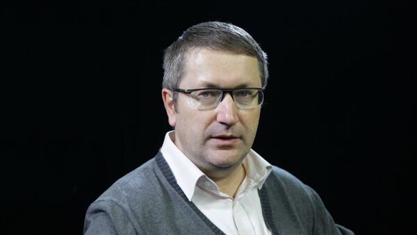 Андрей Карнеев - 俄羅斯衛星通訊社