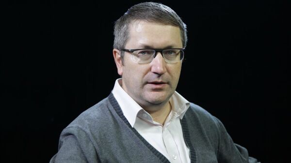 Андрей Карнеев - 俄罗斯卫星通讯社
