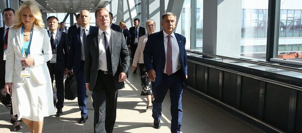 俄總理：美國對華為施壓使中國開發自己的操作系統 - 俄羅斯衛星通訊社