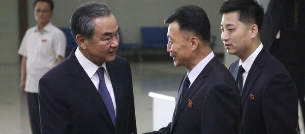 В КНДР с трехдневным визитом находится глава МИД КНР Ван И. - 俄罗斯卫星通讯社