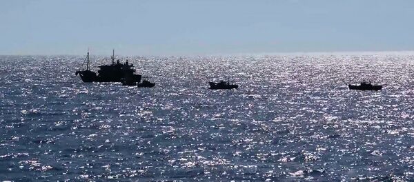 Судна северокорейских браконьеров в исключительной экономической зоне Российской Федерации в Японском море во время их задержания пограничным управлением ФСБ России по Приморскому краю - 俄罗斯卫星通讯社