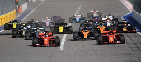 Пилоты команды Феррари Себастьян Феттель и Шарль Леклер принимают участие в гонке на 16-м этапе чемпионата мира по кольцевым автогонкам в классе Формула-1 ВТБ Гран-при России 2019  - 俄罗斯卫星通讯社