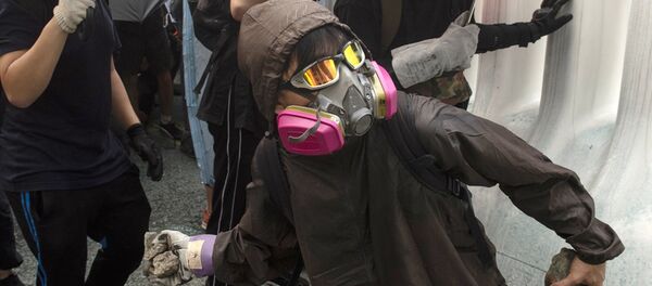 Участник протеста в Гонконге Участник протеста в Гонконге - 俄罗斯卫星通讯社