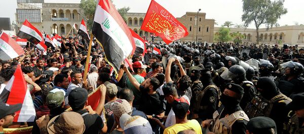 伊拉克安全部隊與示威民眾發生衝突致40人受傷 - 俄羅斯衛星通訊社