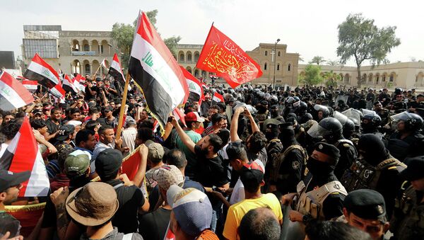 伊拉克安全部队与示威民众发生冲突致40人受伤 - 俄罗斯卫星通讯社