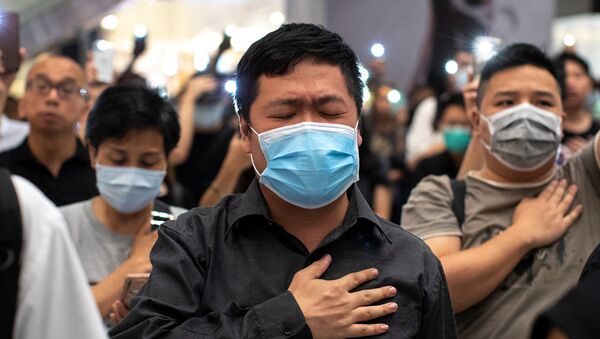 香港政府計劃實行禁止示威遊行者戴口罩的禁令 - 俄羅斯衛星通訊社