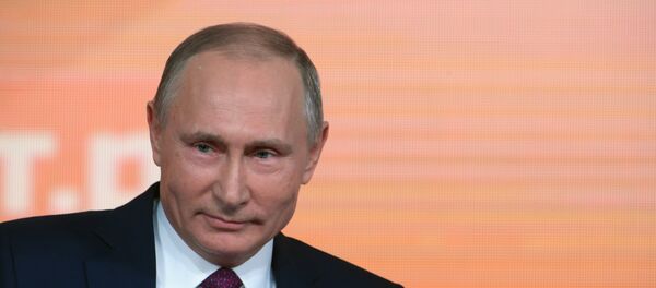 Президент РФ Владимир Путин во время большой ежегодной пресс-конференции - 俄罗斯卫星通讯社