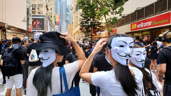 Власти Гонконга ввели запрет на ношение масок на протестах - 俄羅斯衛星通訊社