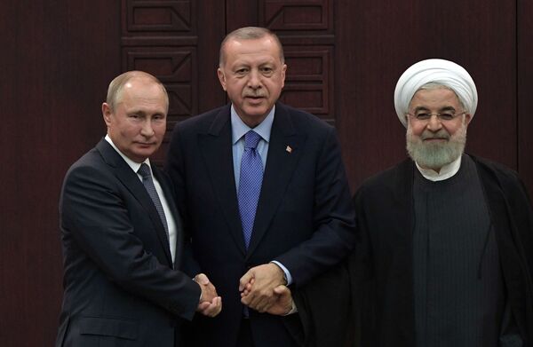 2019年9月16日，俄罗斯总统普京、土耳其总统埃尔多安和伊朗总统鲁哈尼在叙利亚问题阿斯塔纳进程担保国元首第五次会晤后举行的联合记者招待会。 - 俄罗斯卫星通讯社