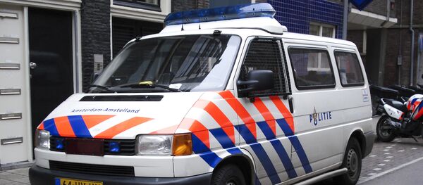 Полицейский автомобиль на улице Амстердама. Архивное фото Полицейский автомобиль на улице Амстердама. Архивное фото - 俄羅斯衛星通訊社