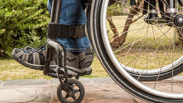 Человек на инвалидной коляске - 俄罗斯卫星通讯社