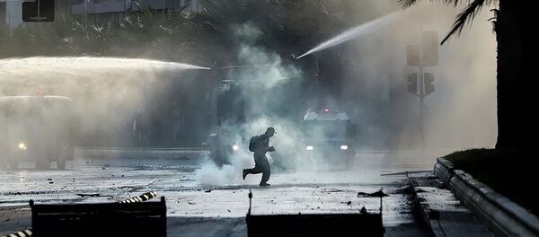 Протестующий во время акции протеста в Сантьяго, Чили Протестующий во время акции протеста в Сантьяго, Чили - 俄羅斯衛星通訊社