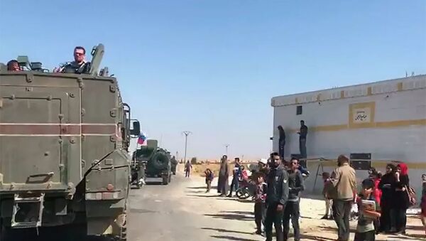 Колонна российской военной полиции прибыла в сирийский город Кобани - 俄羅斯衛星通訊社