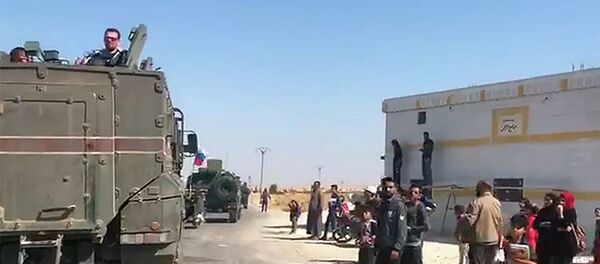 Колонна российской военной полиции прибыла в сирийский город Кобани - 俄罗斯卫星通讯社