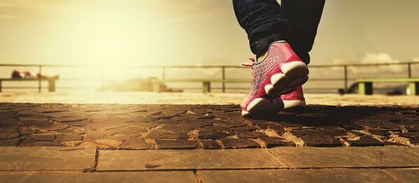 Человек во время ходьбы Человек во время ходьбы - 俄罗斯卫星通讯社