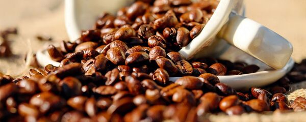 Кофейные зерна в чашке - 俄羅斯衛星通訊社